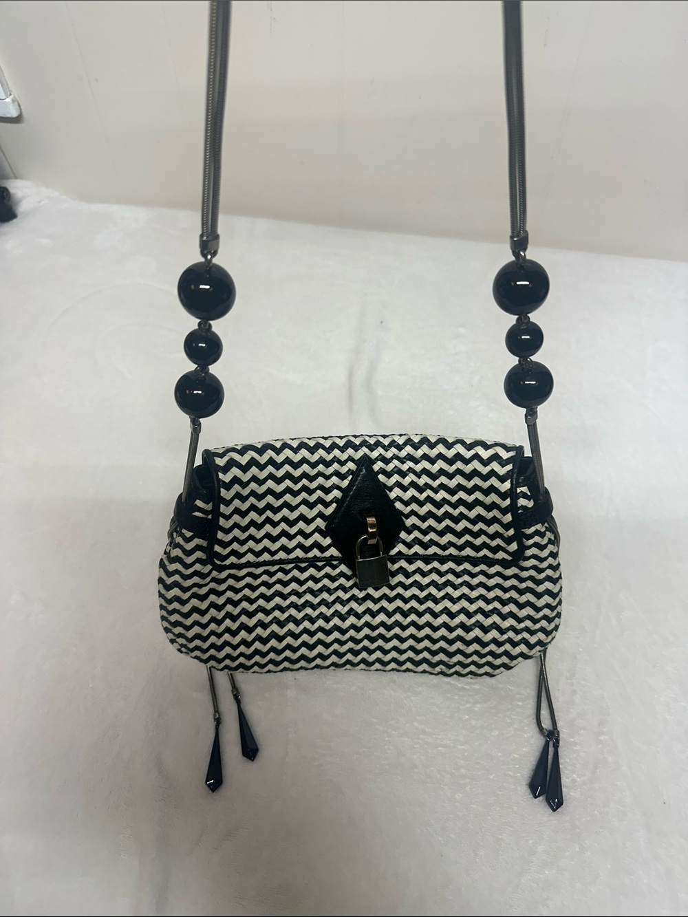 Marc Jacobโs Aztec Woven bag which famously debuted as part 2010 summer Runway